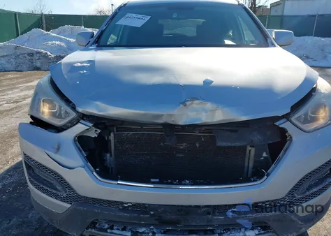 2014 Hyundai Santa Fe Sport 2.4L z USA, uszkodzony, nr VIN 5XYZTDLB8EG145694